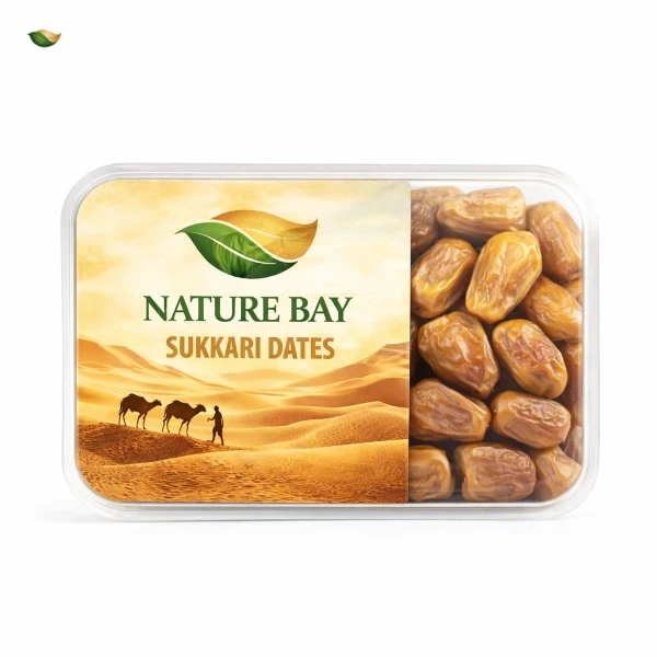 "High-quality Saudi Sukkari dates packed in a transparent box, highlighting their large size and freshness."