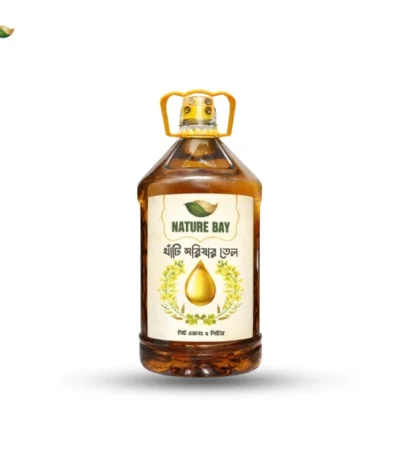 A 5-liter clear plastic jug of Nature Bay Pure Mustard Oil with a yellow handle, featuring a cream-colored label with Bengali text and a graphic of mustard flowers.