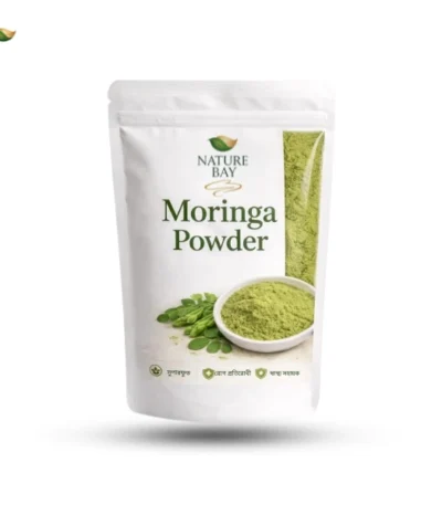 A white stand-up pouch of Nature Bay Moringa Powder featuring a bowl of green powder and fresh moringa leaves.