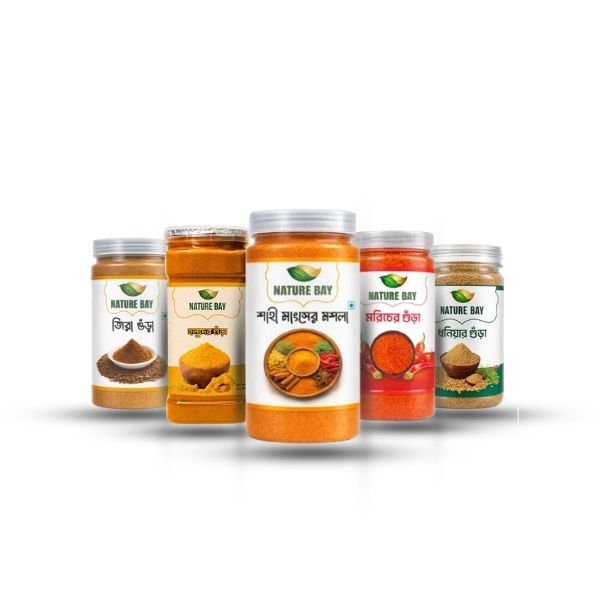 nature_bay_spice_combo Alt Text: Nature Bay Premium Spice Combo Pack featuring 5 jars: Shahi Meat Masala, Chili Powder, Turmeric Powder, Coriander Powder, and Cumin Powder.
